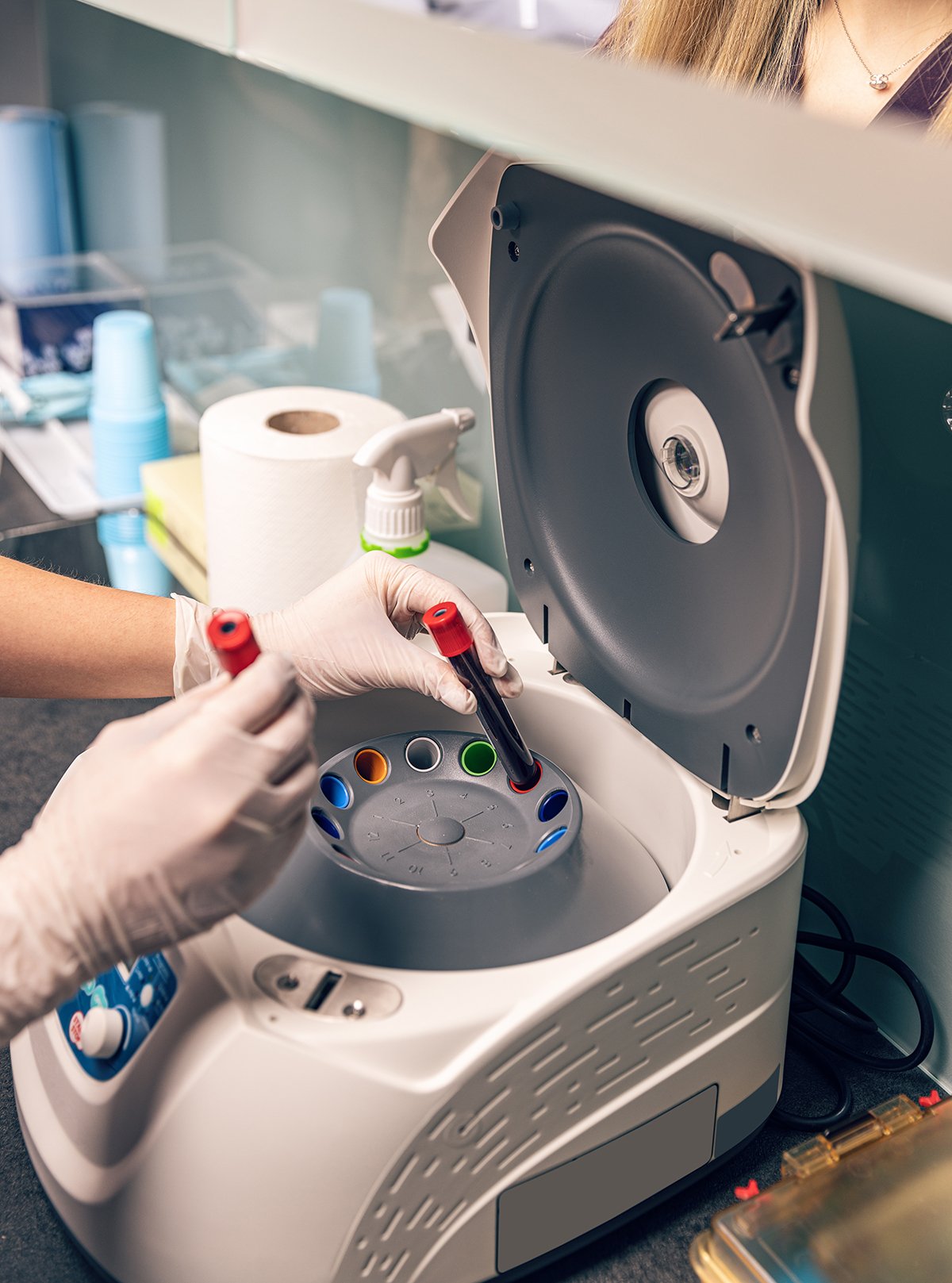 nurse running blood tests for integrative medicine